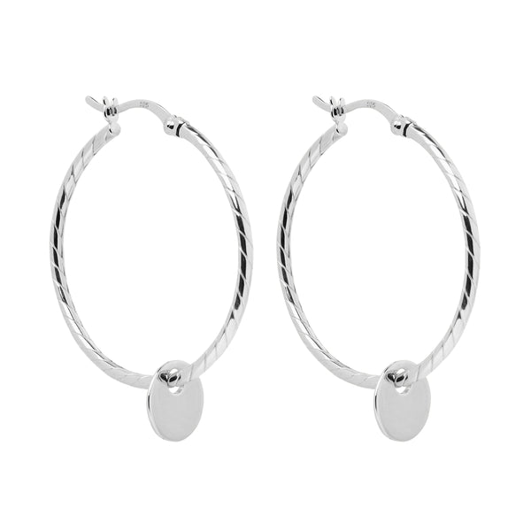 Najo Loop style earrings with disc