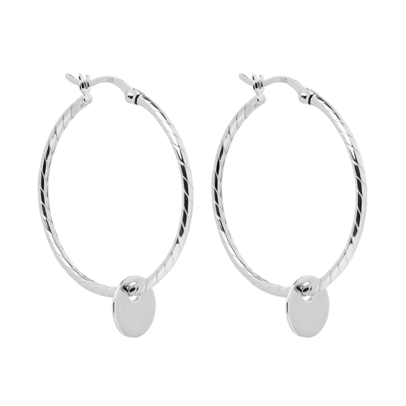 Najo Loop style earrings with disc